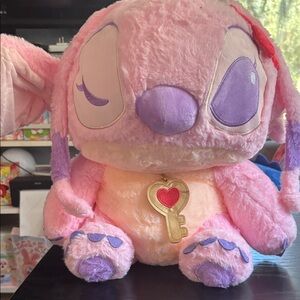Angel Pink and Purple Plush stuffed animal with blanket inside